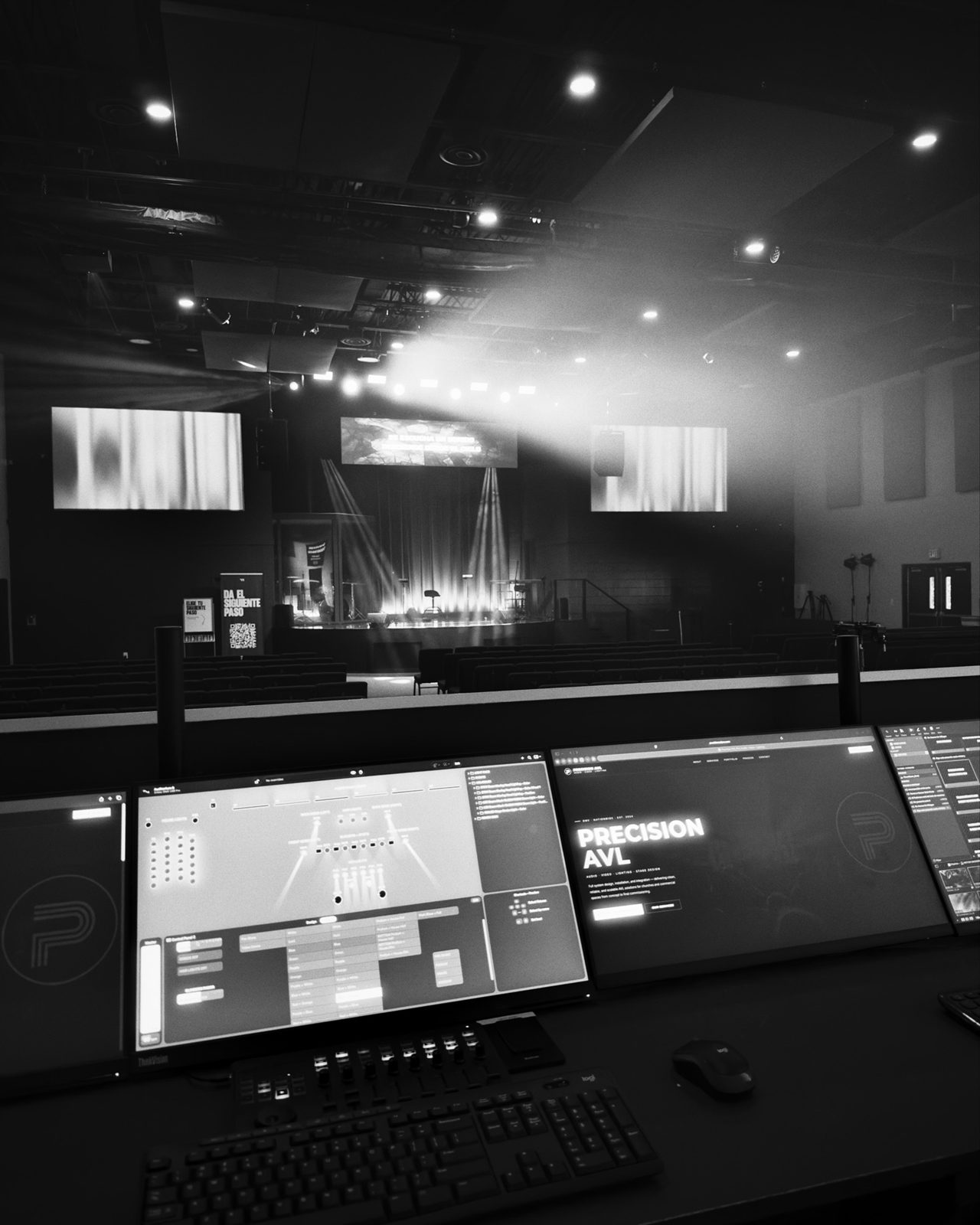 Front of house booth with monitors facing the stage