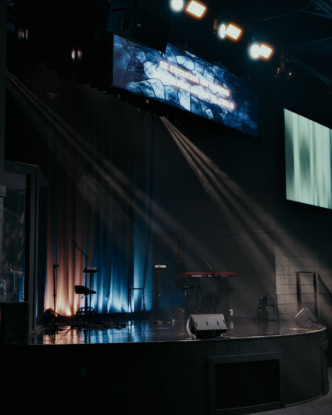 Stage with moving-head beams and LED screen